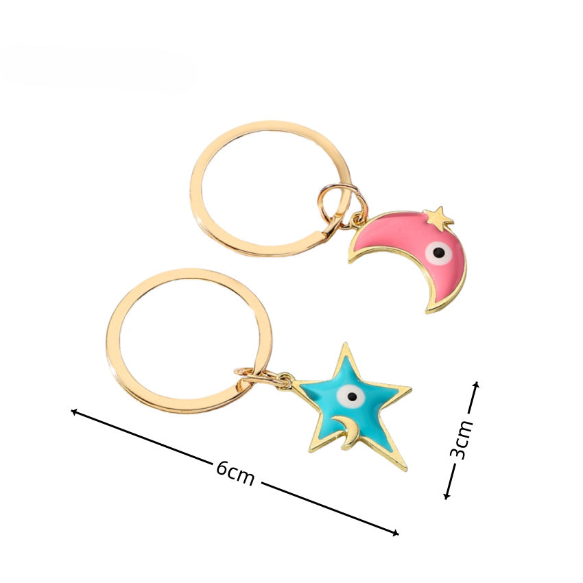 Wholesale Star Moon Demon Eye Couple Metal Keychains
